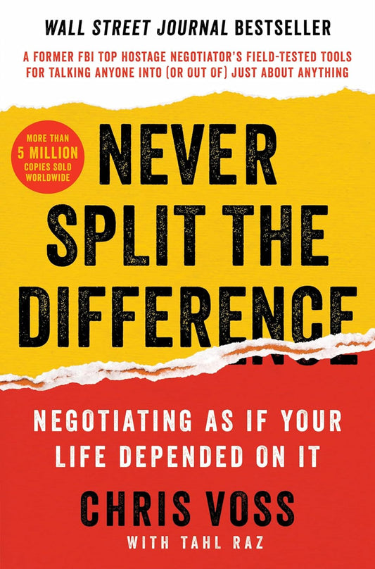 Book cover of 'Never Split the Difference' with yellow and red background
