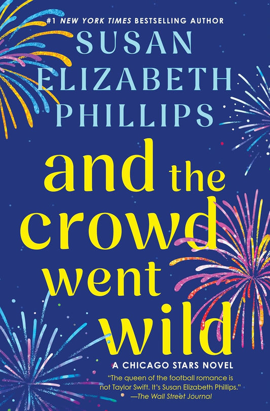 Book cover of 'And the Crowd Went Wild' by Susan Elizabeth Phillips with fireworks design.