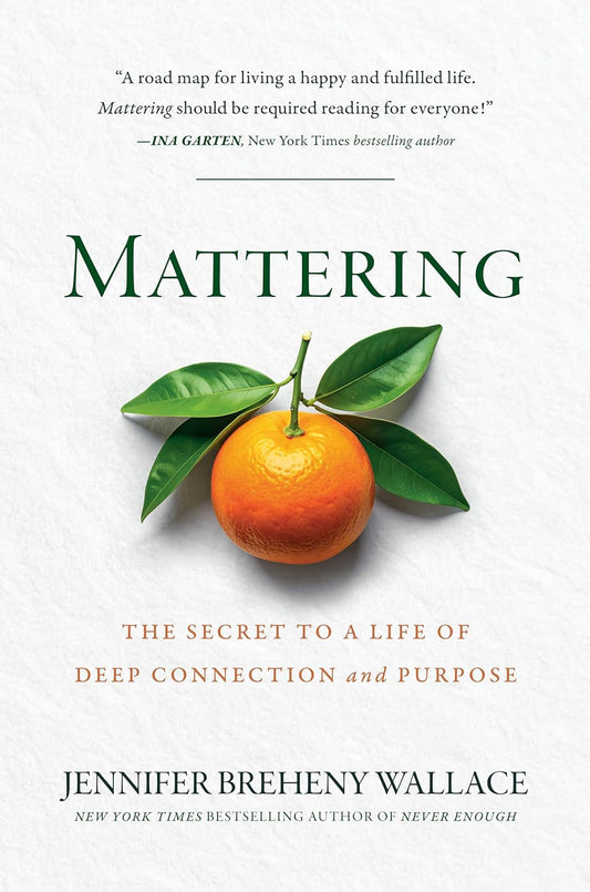 Book cover of 'Mattering' with an orange and leaves on a white background