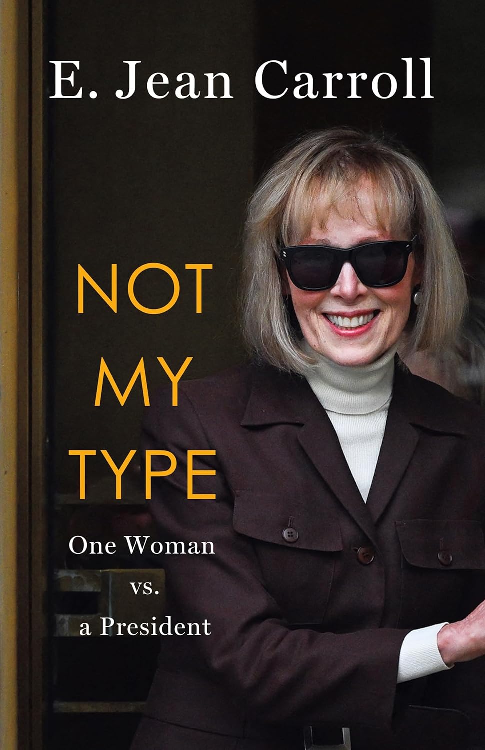 Book cover of 'Not My Type' by E. Jean Carroll with a woman wearing sunglasses and a dark coat.