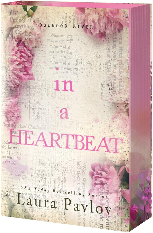 Book cover of 'In a Heartbeat' by Laura Pavlov with floral design and text.
