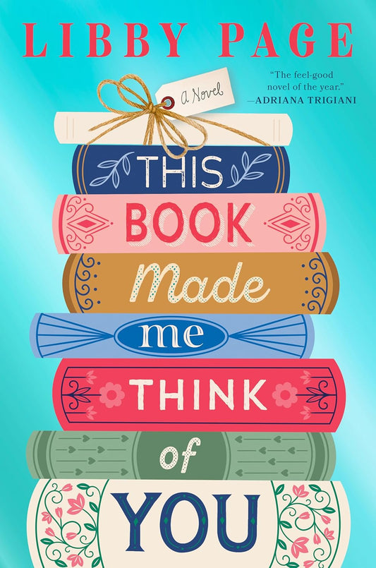 Book cover of 'This Book Made Me Think of You' by Libby Page with stylized books stacked on a blue background.